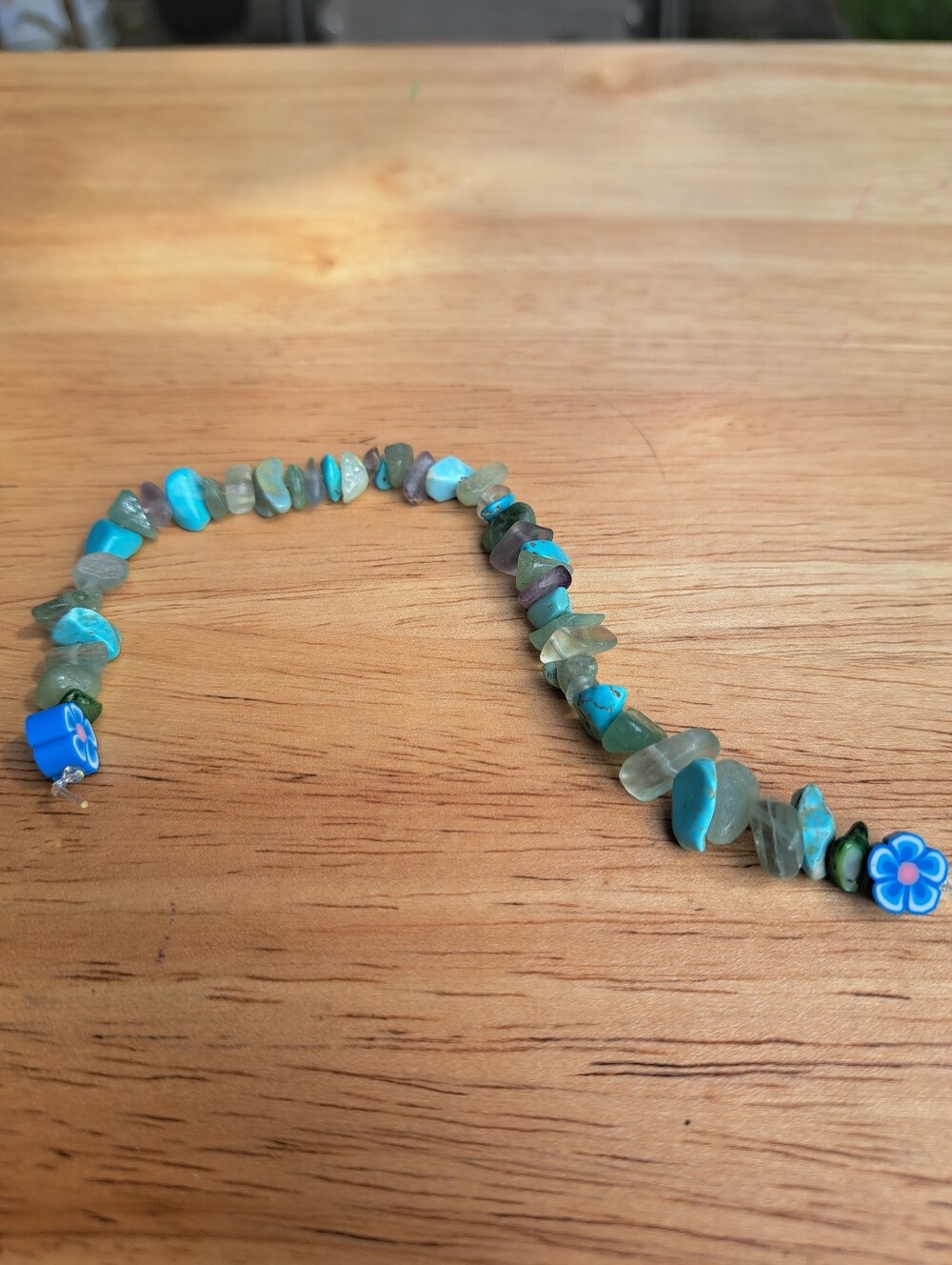 Turquoise Chip Bead Bracelet with Blue Flower Accent